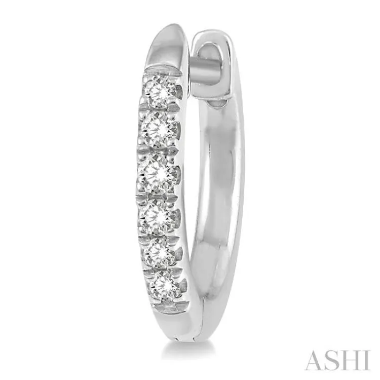 1/8 ctw Round Cut Diamond Huggie Earrings in 14K White Gold