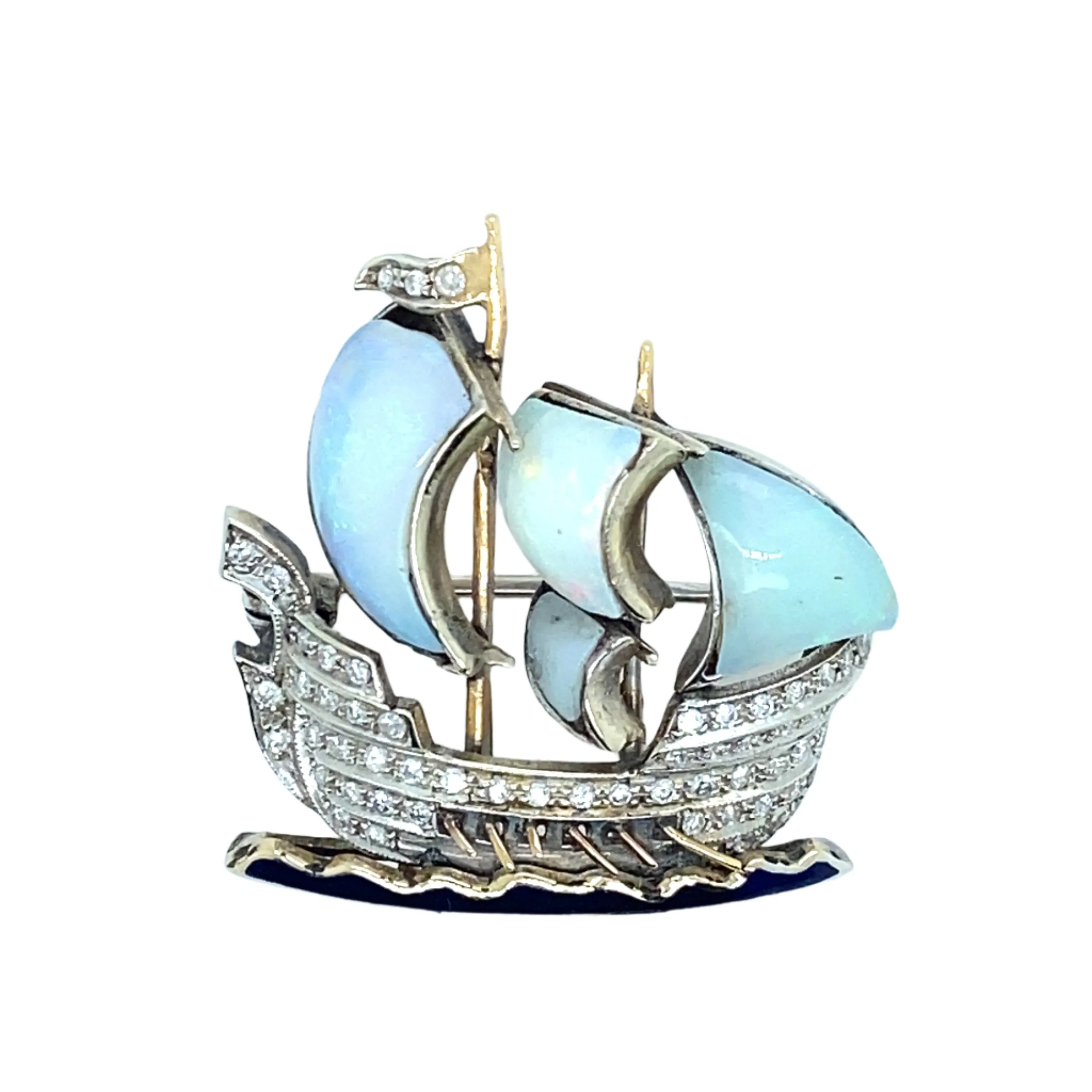 A platinum, gold, diamond and opal brooch in the shape of a caravel with rows on the waves. 1930 c.a.