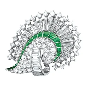 An Art Déco platinum, diamond and emerald brooch. 1925 circa